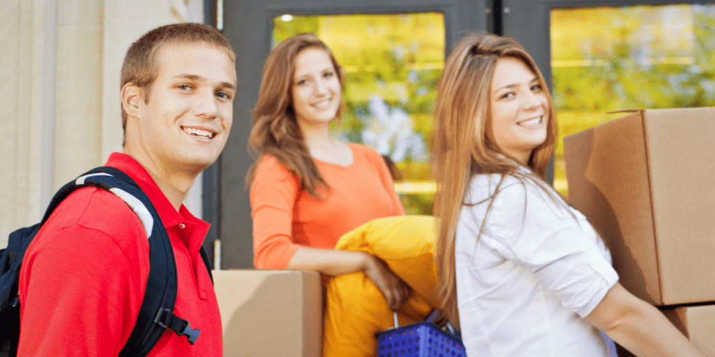 College students moving into their rental apartment.
